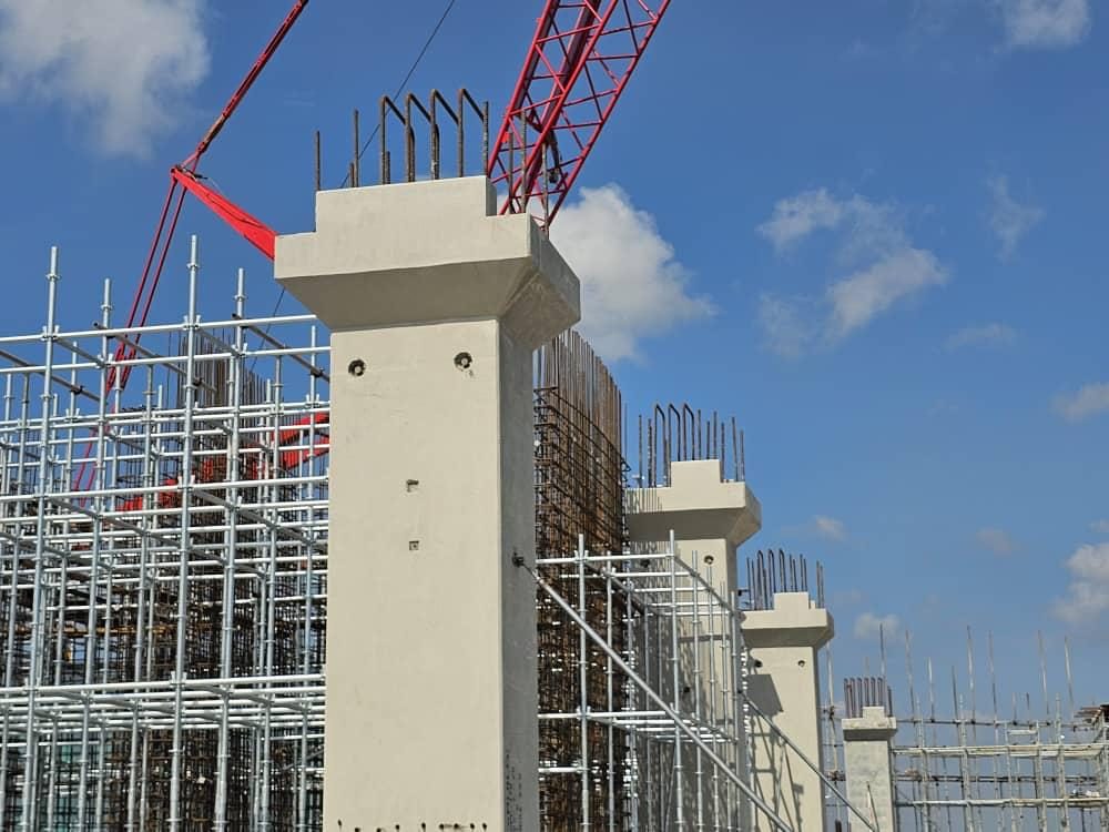 Precast columns with corbel heads erected on a data centre frame
