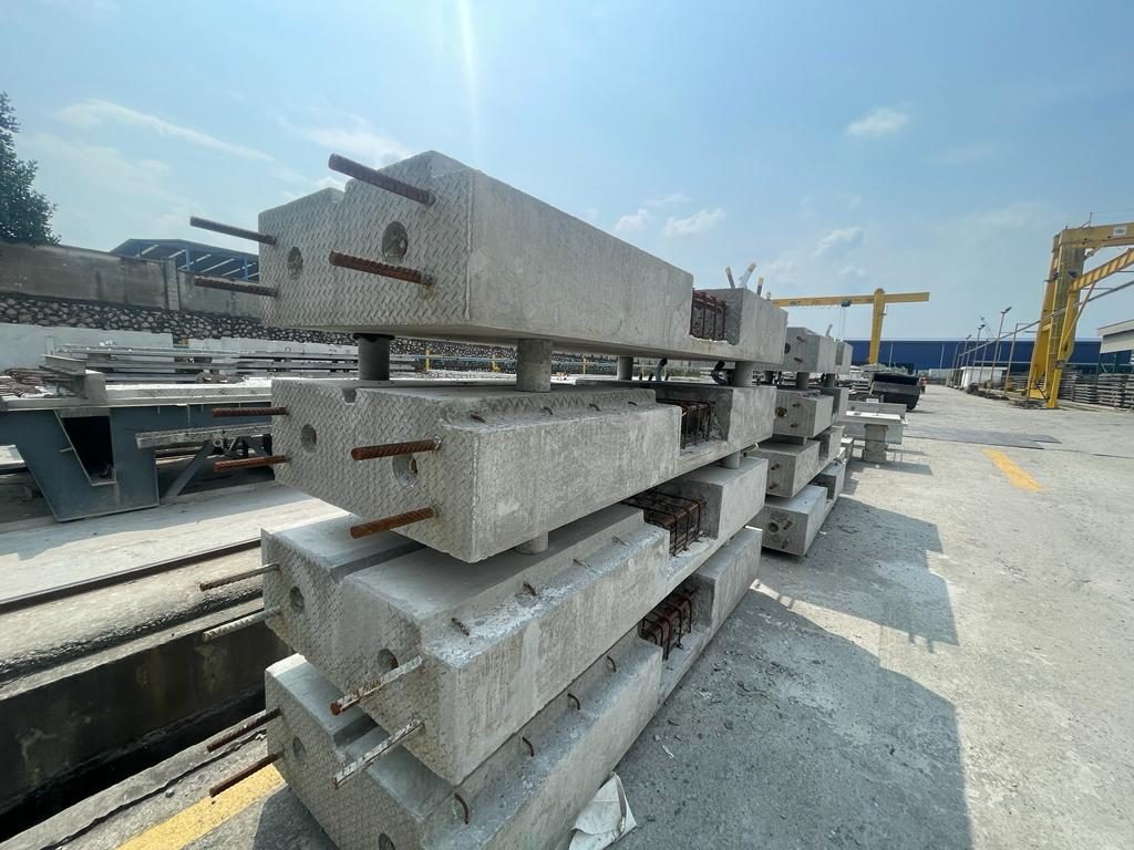 Precast columns with corbels stacked in the yard