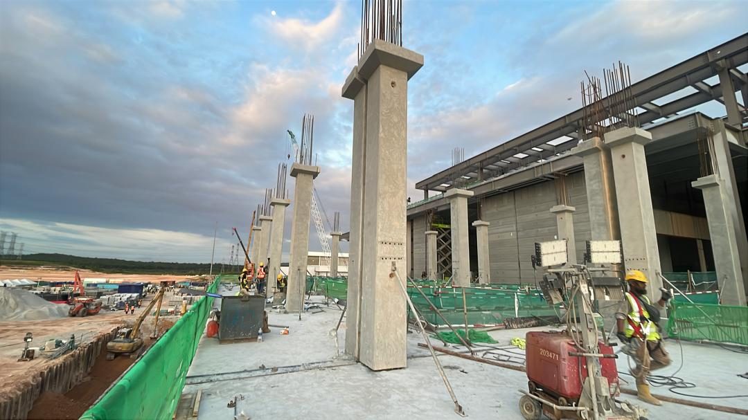 Precast columns standing on site during installation